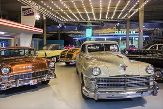1948 Chrysler New Yorker convertible and 1956 Chevrolet Nomad at Autoworld