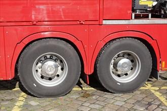 Wheels and tyres on a red Mercedes truck