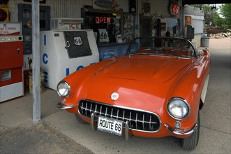 Old Corvette vintage car at gas pump of the General Store along the historic Route 66 in the Hackberry ghost town in Arizona