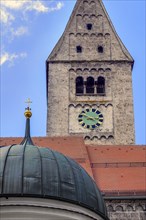 Tower with clock of the parish church of St Martin in Obergünzburg