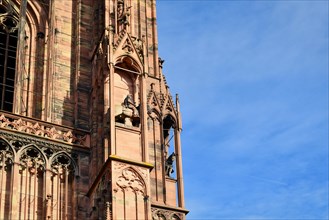 Part of tower of famous Strasbourg Cathedral in France in romanesque and gothic architecture style