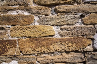 Old sandstone wall as background or texture