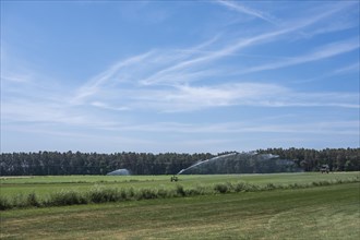 Sprinklers for agricultural irrigation in the Donaumoos in Upper Bavaria