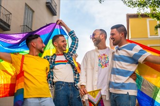Lifestyle of homosexual friends having fun at gay pride party in the city