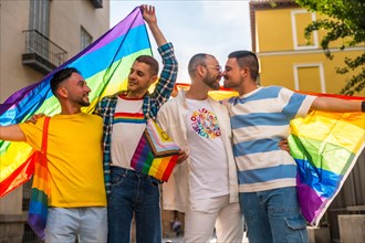 Lifestyle of hugging homosexual friends kissing at gay pride party in the city