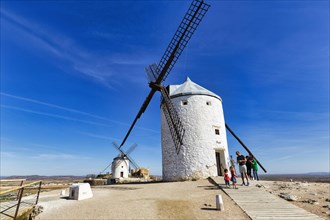 Consuegra windmills with tourists