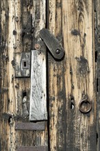 Wooden door and metal lock