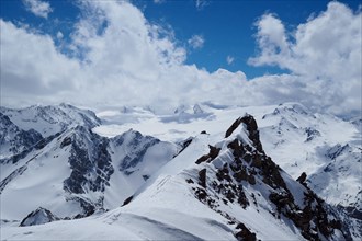 View from the summit of Ölgrubenkopf to the glacier roof of Gepatschferner in the Ötztal Alps in spring
