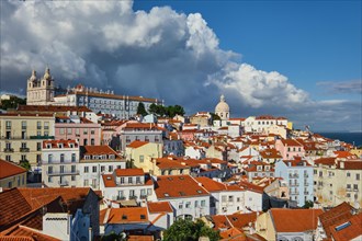 View of Lisbon famous postcard iconic view from Miradouro de Santa Luzia tourist viewpoint over Alfama old city district