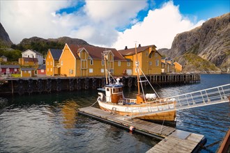 Historic buildings and fishing boats in Nusfjord harbour