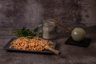 Fresh shrimps in a ceramic tray with parsley