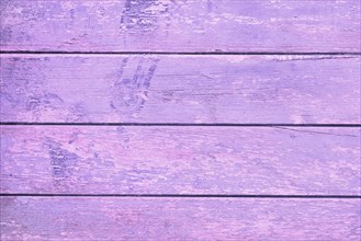 Background with horizontal old wooden planks with chipped paint