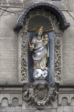 Sculpture of Our Lady on the Crescent Moon on the main façade of the Romanesque Church of Our Lady