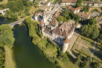 The castle of Cleron and the river Loue seen from the air