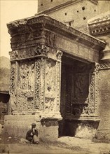Ruin of the Arch of the Moneychangers in Rome in 1875