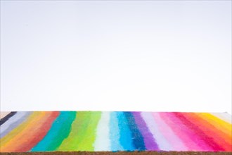 Rainbow colors are painted as stripes