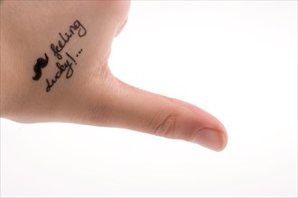 Moustache design on a hand in a white background