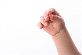 Hand of a baby on a white background