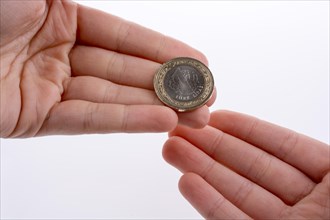 Turkish coin one Turkish Lira in hand