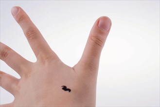 Moustache design on a hand in a white background