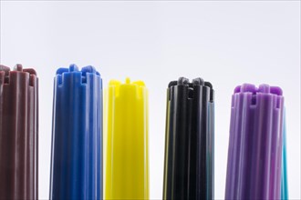 Color felt-tip pens of various color on white background