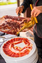 Iberian ham cutter man at a wedding