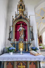 Side altar with Christ figure in the church of St Michael