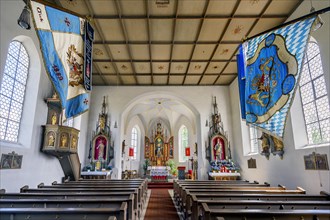 The church of St Michael with coffered ceiling and flags