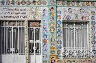 Artistic façade with mosaic with tango motifs in Buenos Aires