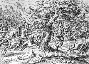 Absalom gets his hair caught on a branch in battle and is killed