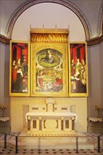 High altar with painting The Burning Bush by painter Nicolas Froment in the Cathedral St-Sauveur