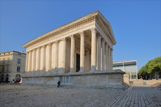 Antique Roman UNESCO podium temple Maison Carrée with columns