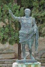 Statue of the 1st Roman Emperor Augustus at the archway Porte d'Auguste