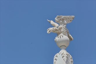 White eagle figure at the ornamental fountain Fontaine des Prêcheurs
