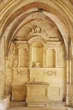 Altar in the cloister of the Romanesque monastery Cloître St-Trophime