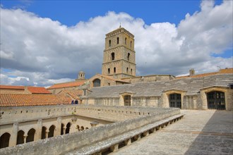 View of church tower and courtyard with cloister