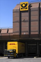 DHL truck loading container