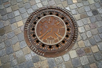 Berlin sights on a manhole cover