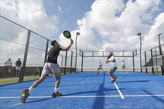 Players in action on a padel court at Kalimera Kriti Resort