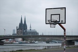 View over the Rhine with cathedral and basketball hoop in the foreground