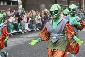 A colourful otherworldly group at the St Patrick's day parade in Dublin in 2023