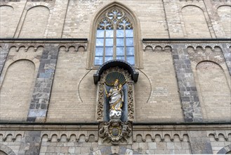 Niche figure of Mary on the west façade of the Church of Our Dear Lady