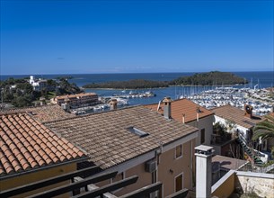 View over the roofs of the town of Vrsar to the harbour