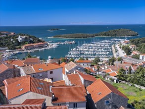 View over the roofs of the town of Vrsar to the harbour