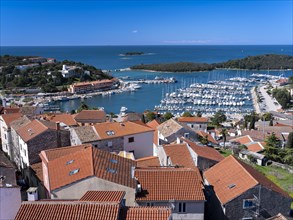 View over the roofs of the town of Vrsar to the harbour