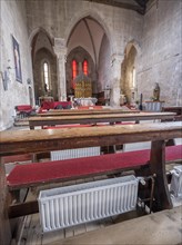 Radiators under the pews in the Franciscan Church