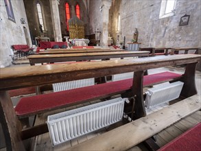 Radiator under the pews of the Franciscan Church