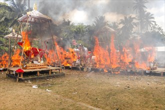 The sarcophagi containing the bones or bodies of the deceased are burnt during the cremation ceremony