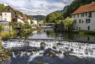 The village of Lods and the river Loue