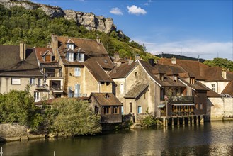 Houses of the old town on the river Loue in Ornans